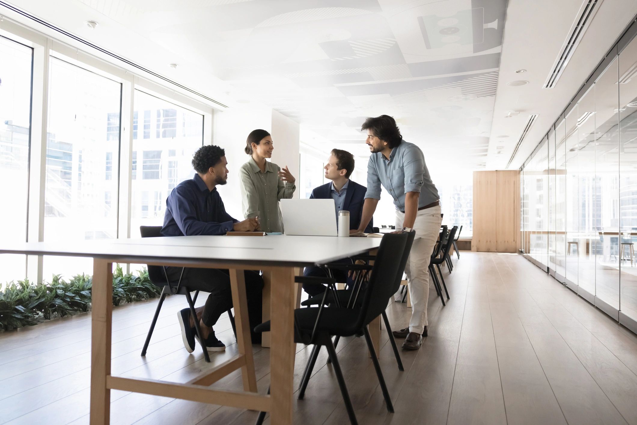 Advisory team member collaborating in office
