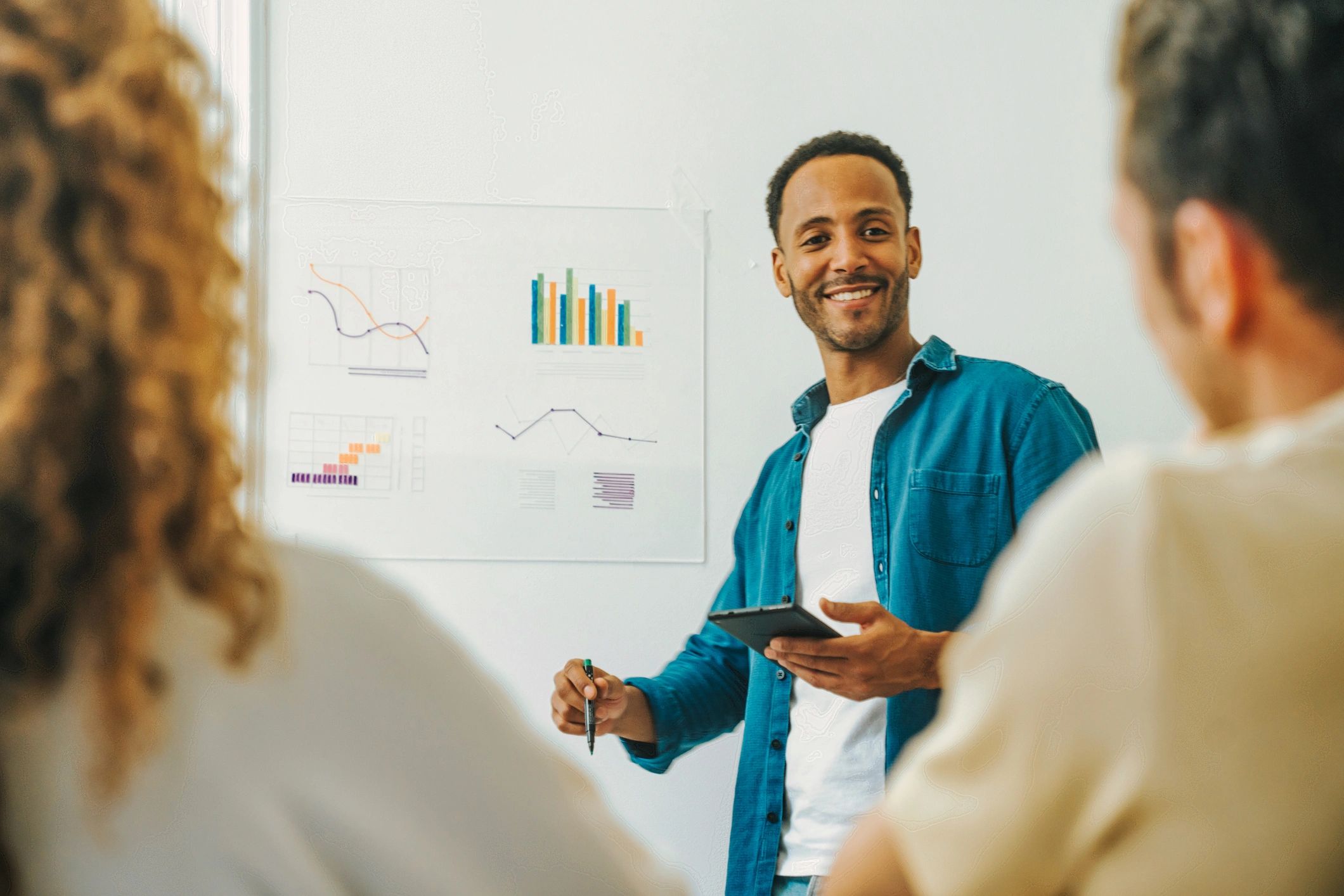 Consultant presenting sustainability strategy in a meeting room